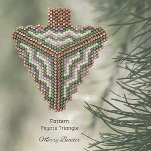 May include: A green, white, and copper beaded triangle pendant with a peyote stitch pattern. The pendant is hanging from a copper chain. The text "Pattern Peyote Triangle Merry Beader" is visible below the pendant.