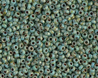 25 grams 11/0 Turquoise Blue Picasso 11-4514 Miyuki Round Seed Bead