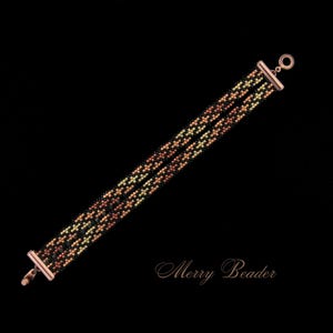 May include: A beaded bracelet with a geometric pattern in shades of black, orange, and yellow. The bracelet has a copper-colored clasp and the text "Merry Beader" in the lower right corner.