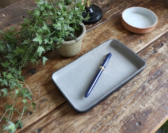 Leather Valet Tray Medium Gray Suede leather interior. Organizing accessories to store lifestyle essentials.