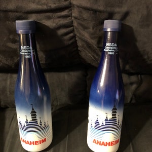 Set of 2 Vintage Disneyland NSDA convention bottles 1985 gently used