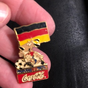 Vintage lot of 10 enamel pins Coca Cola soccer countries 1990s