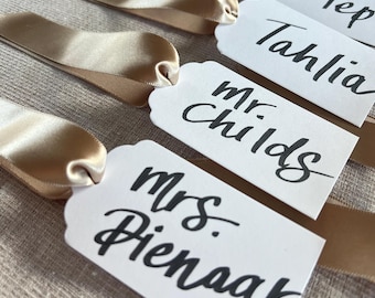 Name Tags | White Card with Gold Ribbon | Hand Calligraphy Brush Lettering (Black ink)