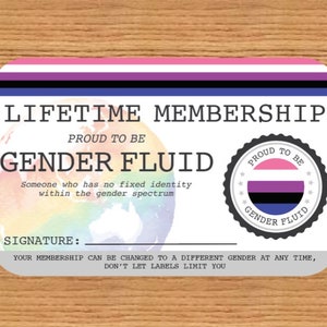 May include: A rectangular card with rounded corners, featuring the words "LIFETIME MEMBERSHIP" and "GENDER FLUID." The card includes a rainbow-colored globe graphic and a circular emblem with the text "PROUD TO BE GENDER FLUID."
