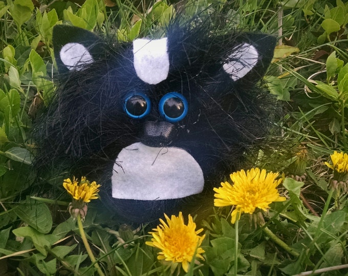Cute Black Skunk Figurine