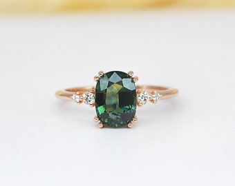 Oval teal sapphire ring Montana sapphire engagement ring  Vintage style ring  Teal sapphire and diamond featuring bespoke engagement ring