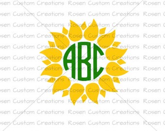 May include: A green circle with the letters ABC inside, surrounded by a yellow sunflower.