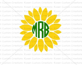 May include: A yellow sunflower with a green circle in the center. The circle has the letters "MRB" in white.