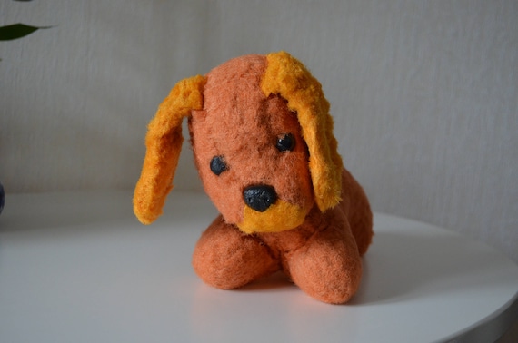 orange stuffed dog