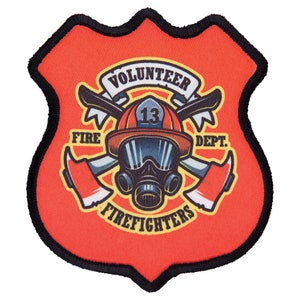 May include: A red and yellow patch with a firefighter helmet, crossed axes, and the text "Volunteer Fire Dept. Firefighters" with the number "13" on the helmet.