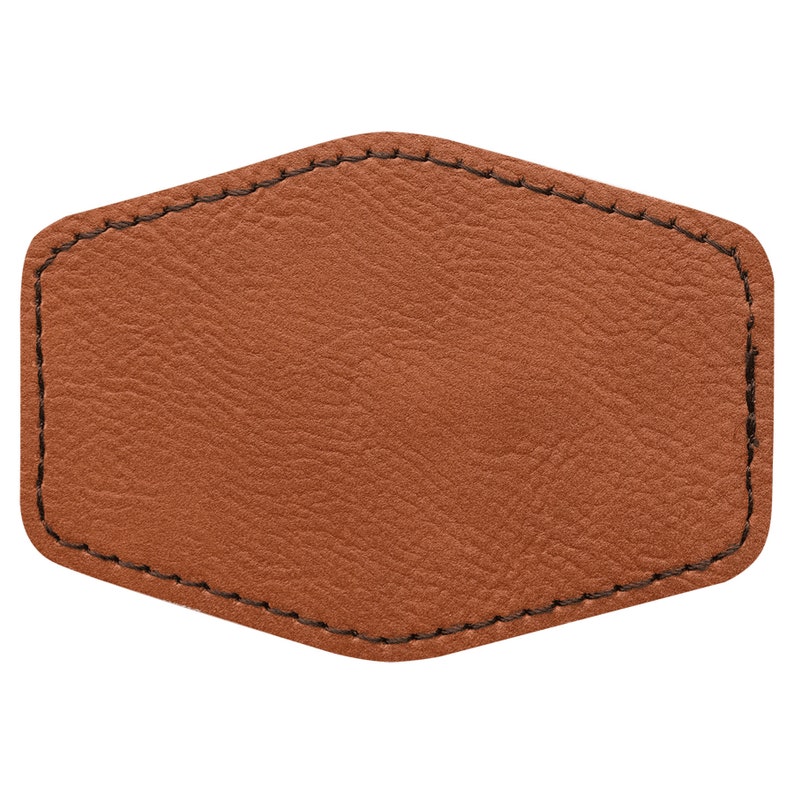 May include: A brown leather patch with a stitched edge. The patch is shaped like a hexagon and has a smooth, textured surface.