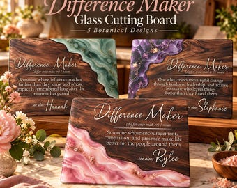 May include: Three rectangular glass cutting boards featuring a dark wood grain pattern with flowing resin accents in green, purple, and pink. Each board displays the definition of Difference Maker and a personalized name: Hannah, Stephanie, or Rylee.