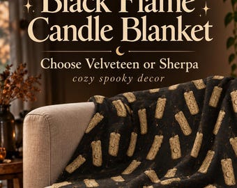 May include: A black blanket featuring a repeating pattern of beige candles with crescent moon symbols. The text reads Black Flame Candle Blanket, Choose Velveteen or Sherpa, cozy spooky decor. The blanket has a thick, cream-colored sherpa lining.
