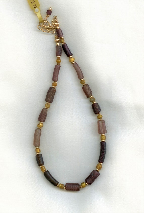 Roman Era Red Twisted Bracelet Fragments and Gold Sandwich Beads