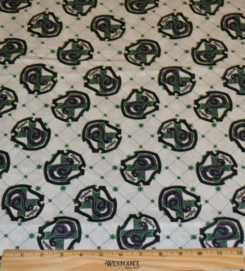 RETIRED HARRY POTTER FABRIC BY THE HALF YARD RON WEASLEY~HERMIONE GRANGER!