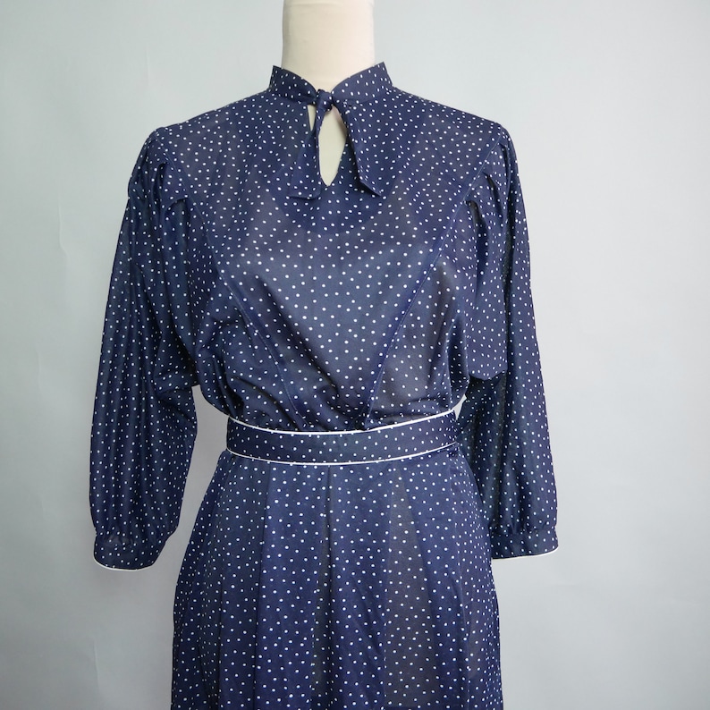 Polka dot print dress in navy white Vintage dress 70s shirt dress with tie neck with yoke Good for work look
