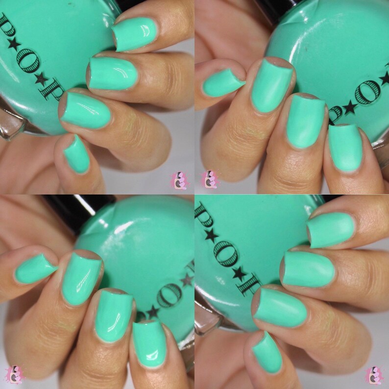 May include: Four images of manicured nails painted in a vibrant, opaque turquoise nail polish. The polish is applied evenly, with a glossy finish. The nail polish bottle is visible, with the brand name "POP" and star details.