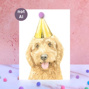 May include: A watercolor illustration of a golden-colored dog with curly fur wearing a shiny gold party hat topped with a small purple pom-pom. The dog has a happy expression with its tongue hanging out. A circular badge says not AI.