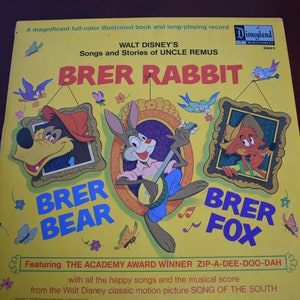 May include: A yellow record album cover featuring illustrations of Brer Rabbit, Brer Bear, and Brer Fox. The album cover is titled "Walt Disney's Songs and Stories of Uncle Remus: Brer Rabbit". The album cover also features the text "Featuring The Academy Award Winner Zip-A-Dee-Doo-Dah with all the happy songs and the musical score from the Walt Disney classic motion picture Song of the South."