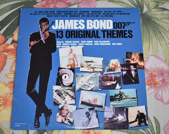 Vintage James Bond - 13 Original Themes vinyl record LP Album, LJ-51138, Sean Connery, Roger Moore, Ian Flemming, James Bond Movies