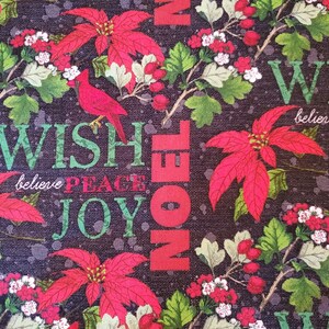 May include: A black background with a red poinsettia, green leaves, and white flowers. The words "WISH", "believe", "PEACE", "JOY", "NOEL", and "WIS", "believe", "PEACE", "JOY" are written in green and red.