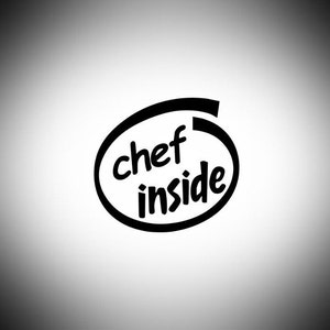 May include: Black and white graphic with the words "chef inside" in a stylized oval design. The text is in a bold, rounded font, and the overall image has a clean, modern aesthetic, suitable for kitchen-themed products.