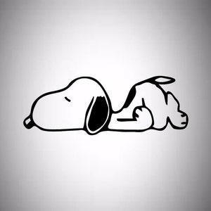 May include: A black and white illustration of Snoopy, the cartoon beagle, lying down. The dog is in a relaxed pose, with his eyes closed and his body curved. The image is a simple, minimalist design.