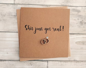 Handmade funny rude engagement card - "sh*t just got real" - with wooden rings embellishment - can be personalised
