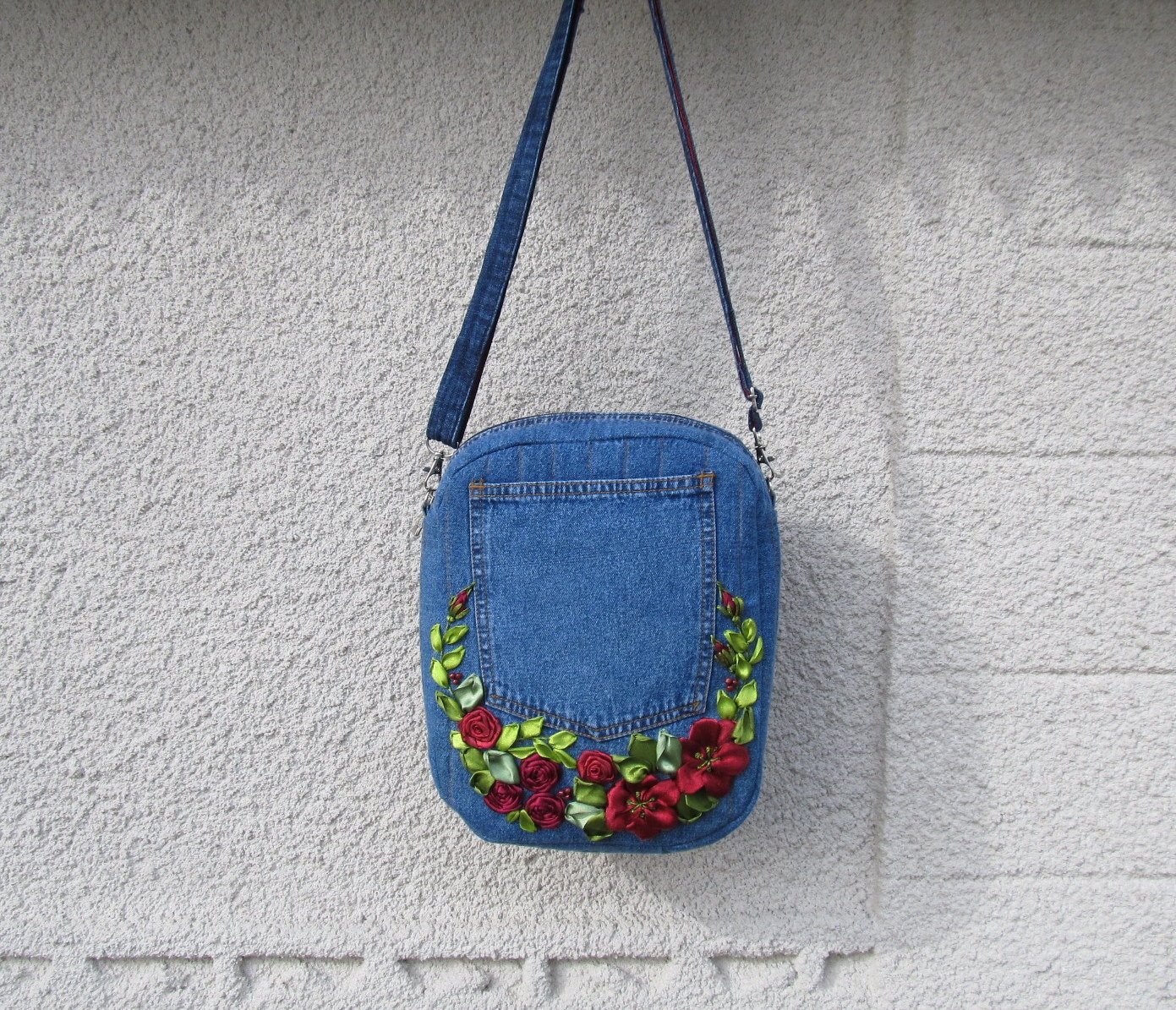 beacon small embroidered denim backpack