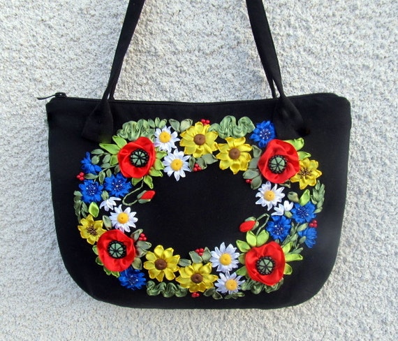 black purse with flowers
