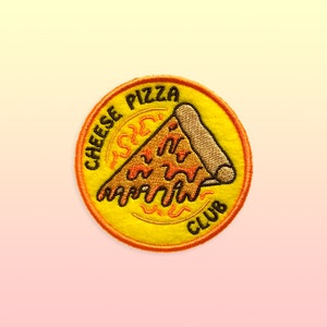 May include: A yellow embroidered patch with the text "Cheese Pizza Club" and a cartoon image of a slice of pizza with dripping cheese.