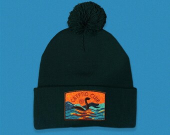 Loch Ness Cryptid Club Pom Pom Beanie