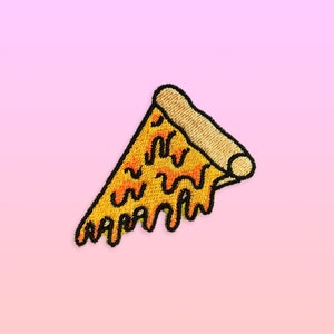 May include: A yellow and orange embroidered pizza slice with dripping cheese, on a pink background.