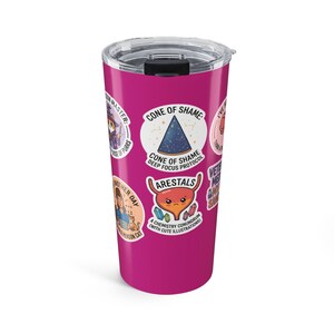 May include: A magenta stainless steel tumbler with a clear plastic lid, featuring various circular stickers with cartoon illustrations and text including Cone of Shame, Arestals, and other phrases related to veterinary medicine and science.