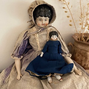 Antique set of 2 China head dolls porcelain dolls Victorian sawdust filled body hand painted black hair