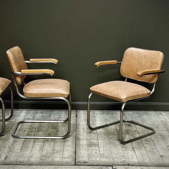 A set of FOUR early s64 Marcel Breuer Cantilever Chairs by Thonet, circa 1950's.