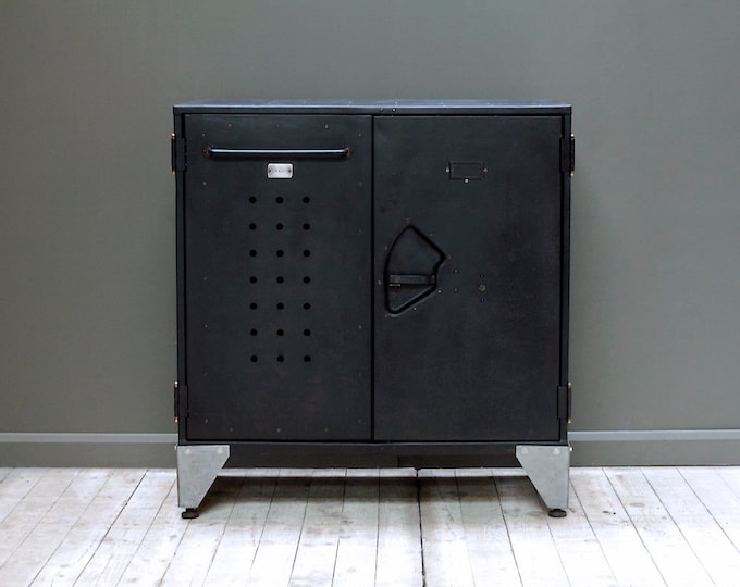 An industrial two door cabinet marked No.195
