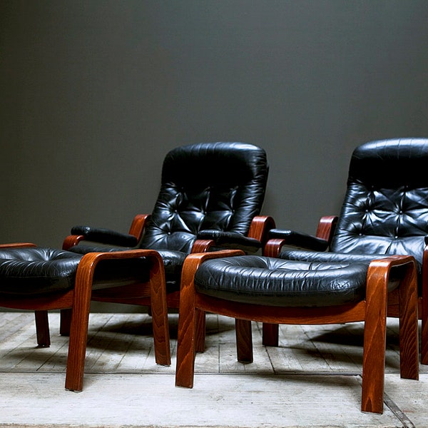 SOLD. A 1970's Pair of "Relax II" Chairs and Foot Stools by Göte Möbler Nassjö