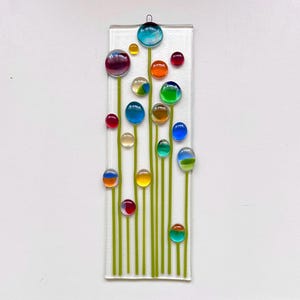 Fused glass suncatcher/wall hanging with colorful pebble flowers