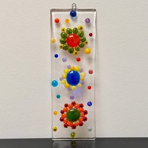 Fused glass suncatcher/wall decoration with colorful flowers