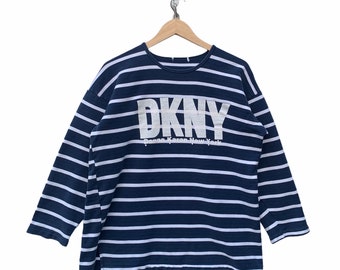 Camicia a righe vintage DKNY Longaleeve Donna Karan DKNY con logo frontale Spellout Hip Hop Rap taglia Large (vedi misure)