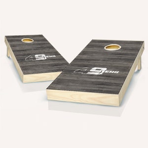 UNC Charlotte Distressed Cornhole Boards - Officially Licensed NCAA Outdoor Lawn Game - Includes Custom Team Bags - On Sale!