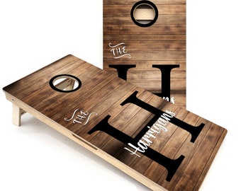 Wood Slat Name Cornhole Boards - Official Regulation Size Tournament Cornhole Set - Includes Scoreboard Leg Brace