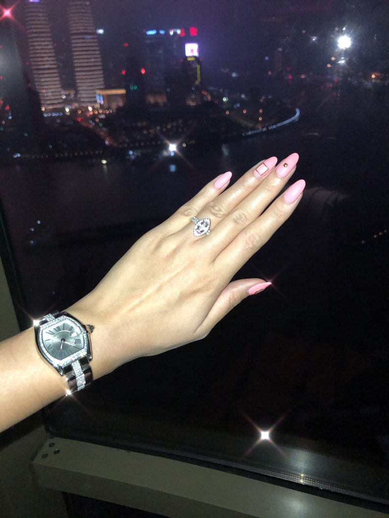 Marquise Morganite Ring with a Double Diamond Halo
