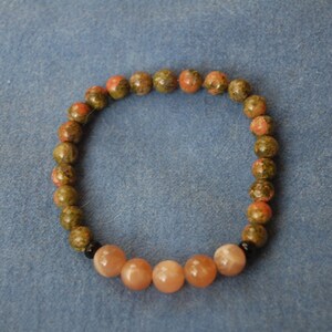 Gemstone Energy Bracelet Red Moonstone And Unakite With Black Onyx Gemlore Gemstone Properties image 1