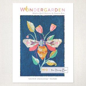 May include: A modern quilt pattern titled "Wondergarden" featuring a colorful bee design with floral accents. The pattern, labeled "No. 9 The Honey Bee," is set against a blue background. The text "Look at this life - all mystery and magic - Harry Houdini" is at the bottom.
