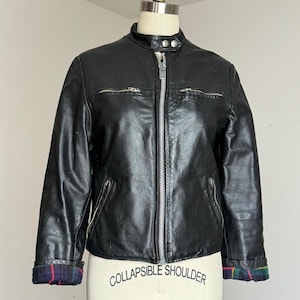 vintage 1960s black leather biker jacket