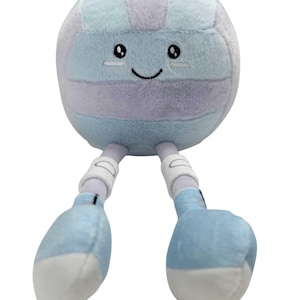 May include: A soft toy volleyball with a smiling face, light blue and lavender stripes, and attached legs and feet. The feet are blue with white tips. The toy is designed to look like a friendly character.