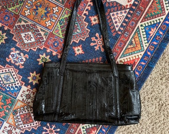 1960s Minimal Eelskin Shoulder Bag . Hide and Chic Inc.