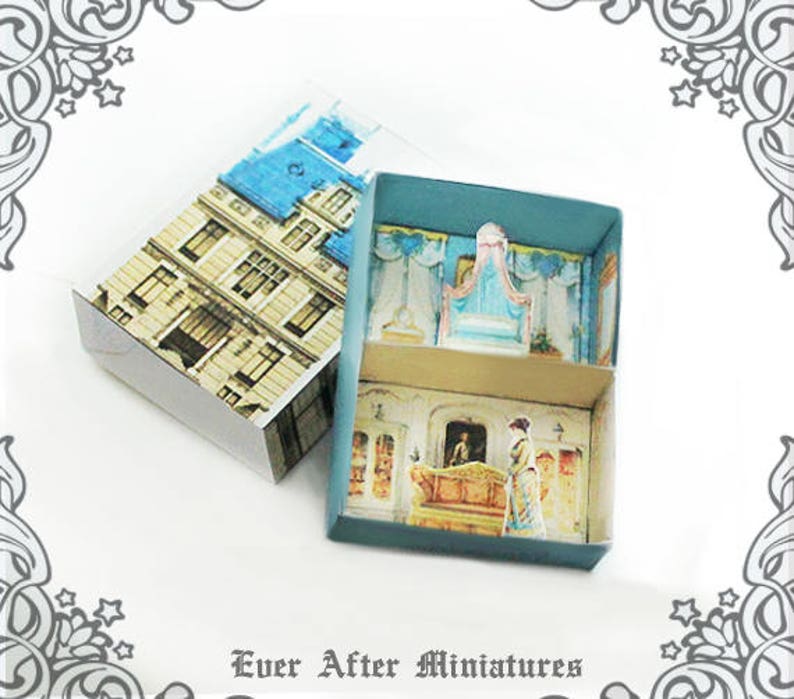 May include: A miniature dollhouse with a blue and white exterior and a blue interior. The dollhouse is made of cardboard and has a printed design. The dollhouse is open and shows the interior, which is furnished with a bed, a chair, and a table.